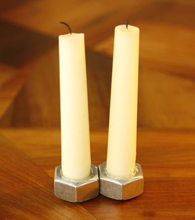 Nuts 2008
These individual candleholders of different circumferences can be made into a cluster
Found objects