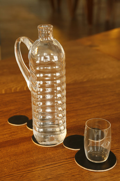 Aqua Minerale 2008 Mouth-blown glass. By designing the glass jug in a generic water bottle shape, a normally disposable object becomes non-disposable.